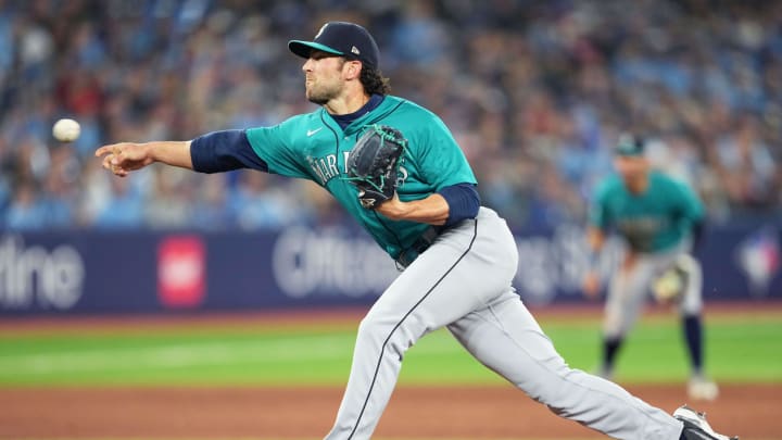 Apr 28, 2023; Toronto, Ontario, CAN; Seattle Mariners relief pitcher Penn Murfee (56) throws a pitch
