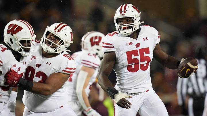 Wisconsin linebacker Maema Njongmeta (55) celebrates his fumble recovery during the fourth quarter of their game Saturday, November 25, 2023 at Huntington Bank Stadium in Minneapolis, Minnesota. Wisconsin beat Minnesota 28-14. Wisconsin linebacker Maema Njongmeta (55) celebrates his fumble recovery during the fourth quarter of their game Saturday, November 25, 2023 at Huntington Bank Stadium in Minneapolis, Minnesota. Wisconsin beat Minnesota 28-14.