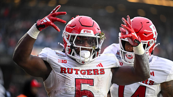 Dec 28, 2023; Bronx, NY, USA; Rutgers Scarlet Knights running back Kyle Monangai (5) celebrates his