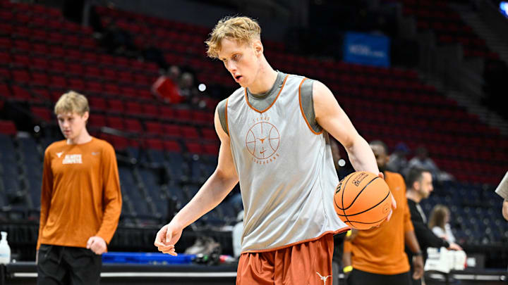 Mar 18, 2026; Portland, OR, USA; Texas Longhorns center Matas Vokietaitis (8) dribbles the ball during a practice session ahead of the first round of the men's 2026 NCAA Tournament at Moda Center. Mandatory Credit: Craig Strobeck-Imagn Images
