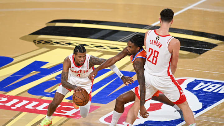 Dec 14, 2024; Las Vegas, Nevada, USA; Houston Rockets guard Jalen Green (4) controls the ball against Oklahoma City Thunder guard Cason Wallace (22) during the second quarter in a semifinal of the 2024 Emirates NBA Cup at T-Mobile Arena. Mandatory Credit: Candice Ward-Imagn Images Dec 14, 2024; Las Vegas, Nevada, USA; Houston Rockets guard Jalen Green (4) controls the ball against Oklahoma City Thunder guard Cason Wallace (22) during the second quarter in a semifinal of the 2024 Emirates NBA Cup at T-Mobile Arena. Mandatory Credit: Candice Ward-Imagn Images