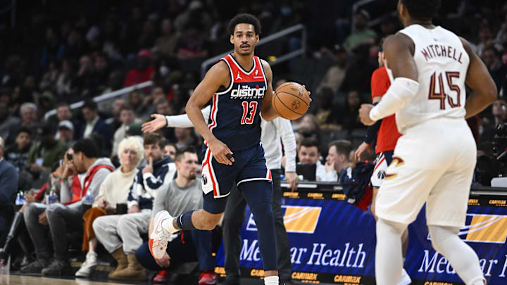 Feb 7, 2024; Washington, District of Columbia, USA; Washington Wizards guard Jordan Poole (13) dribbles against the Cleveland Cavaliers during the second half at Capital One Arena. Mandatory Credit: Brad Mills-Imagn Images