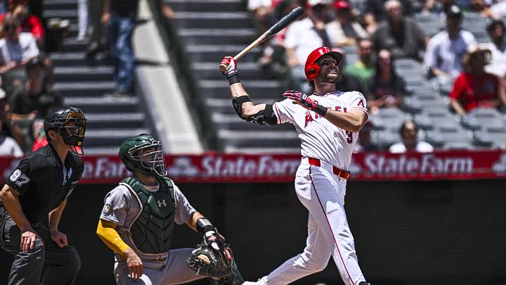 Jun 28, 2026; Anaheim, California, USA; Los Angeles Angels center fielder Josh Lowe (3) hits a grand slam home run against Athletics catcher Shea Langeliers (23) during third inning at Angel Stadium. Mandatory Credit: Jonathan Hui-Imagn Images
