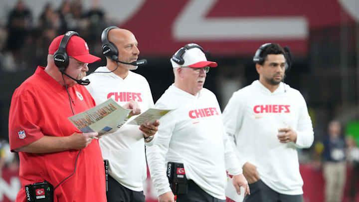 Aug 9, 2025; Glendale, Arizona, USA; Kansas City Chiefs head coach Andy Reid and staff look on against the Arizona Cardinals during the first half at State Farm Stadium. Mandatory Credit: Joe Camporeale-Imagn Images