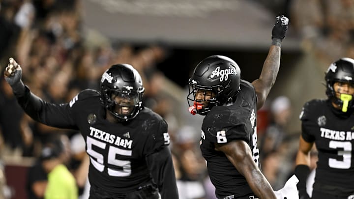 Oct 26, 2024; College Station, Texas, USA; Texas A&M Aggies running back Le'Veon Moss (8) reacts after scoring a touchdown against the LSU Tigers in the fourth quarter at Kyle Field. Mandatory Credit: Maria Lysaker-Imagn Images. Oct 26, 2024; College Station, Texas, USA; Texas A&M Aggies running back Le'Veon Moss (8) reacts after scoring a touchdown against the LSU Tigers in the fourth quarter at Kyle Field. Mandatory Credit: Maria Lysaker-Imagn Images.