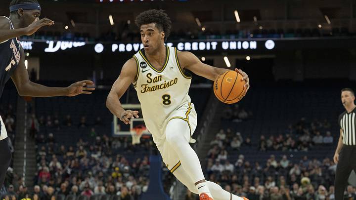 Feb 18, 2026; San Francisco, California, USA;  San Francisco Dons forward David Fuchs (8) drives the ball during the first half against the Gonzaga Bulldogs at Chase Center. Mandatory Credit: Stan Szeto-Imagn Images