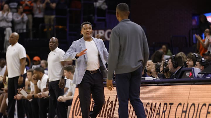 Feb 8, 2025; Charlottesville, Virginia, USA; Georgia Tech Yellow Jackets head coach Damon Stoudamire (center) greets Virginia Cavaliers head coach Ron Sanchez (right) after their game at John Paul Jones Arena. Mandatory Credit: Amber Searls-Imagn Images Feb 8, 2025; Charlottesville, Virginia, USA; Georgia Tech Yellow Jackets head coach Damon Stoudamire (center) greets Virginia Cavaliers head coach Ron Sanchez (right) after their game at John Paul Jones Arena. Mandatory Credit: Amber Searls-Imagn Images
