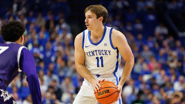 Oct 23, 2024; Lexington, KY, USA; Kentucky Wildcats guard Travis Perry (11) holds the ball during the second half against the Kentucky Wesleyan Panthers at Rupp Arena at Central Bank Center. Mandatory Credit: Jordan Prather-Imagn Images