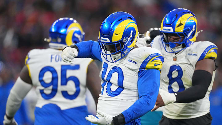 Oct 19, 2025; London, United Kingdom; Los Angeles Rams linebacker Josaiah Stewart (10) and linebacker Jared Verse (8) reacts after a play against the Jacksonville Jaguars during the second half of an NFL International Series game at Wembley Stadium. Mandatory Credit: Kirby Lee-Imagn Images