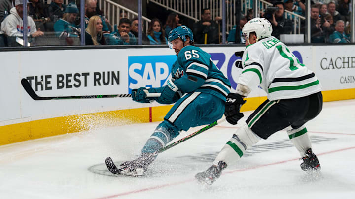 Jan 18, 2023; San Jose, California, USA;  San Jose Sharks defenseman Erik Karlsson (65) and Dallas