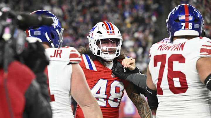 Elliss's hit on Dart sparked an altercation between Patriots linebacker Jahlani Tavai (#48) and Giants guard Jon Runyan (#76) during Monday's game. 