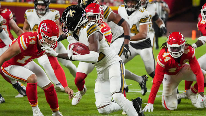 New Orleans Saints running back Alvin Kamara attempts to rush against the Kansas City Chiefs