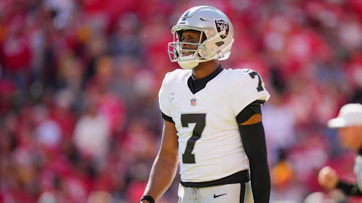 Oct 19, 2025; Kansas City, Missouri, USA; Las Vegas Raiders quarterback Geno Smith (7) reacts during the fourth quarter of the game against the Kansas City Chiefs at GEHA Field at Arrowhead Stadium. Mandatory Credit: Jay Biggerstaff-Imagn Images