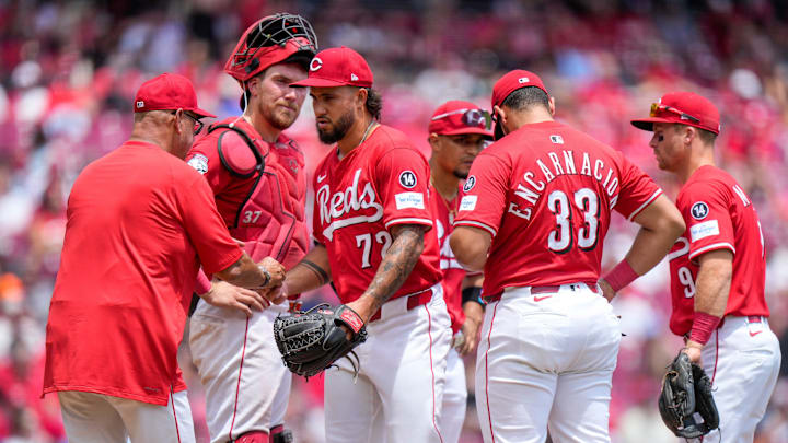 Cincinnati Reds manager Terry Francona (77) pulls pitcher Lyon Richardson (72) in the fourth inning of the MLB interleague game between the Cincinnati Reds and the Minnesota Twins at Great American Ball Park in downtown Cincinnati on Thursday, June 19, 2025. The Twins led 9-4 after four innings. Cincinnati Reds manager Terry Francona (77) pulls pitcher Lyon Richardson (72) in the fourth inning of the MLB interleague game between the Cincinnati Reds and the Minnesota Twins at Great American Ball Park in downtown Cincinnati on Thursday, June 19, 2025. The Twins led 9-4 after four innings.