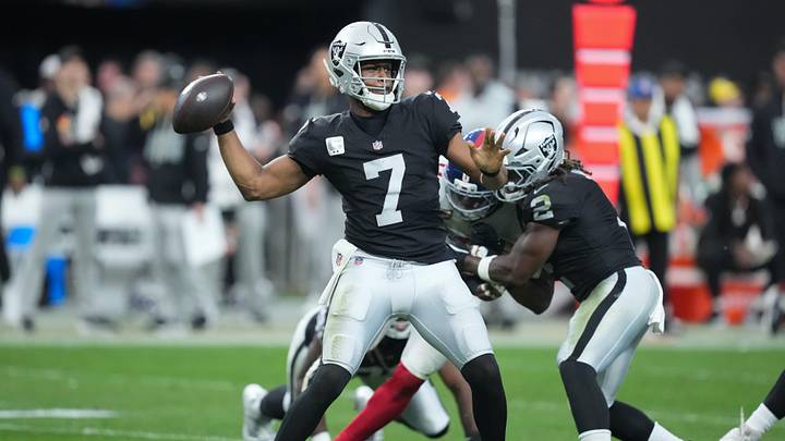 Dec 28, 2025; Paradise, Nevada, USA; Las Vegas Raiders quarterback Geno Smith (7) throws in the third quarter against the New York Giants at Allegiant Stadium. Mandatory Credit: Kirby Lee-Imagn Images