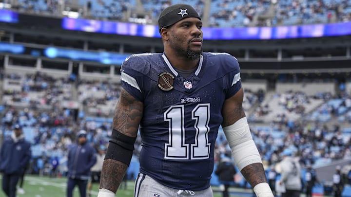 Dec 15, 2024; Charlotte, North Carolina, USA; Dallas Cowboys linebacker Micah Parsons (11) walks onto the field during the first quarter against the Carolina Panthers at Bank of America Stadium. Mandatory Credit: Jim Dedmon-Imagn Images
