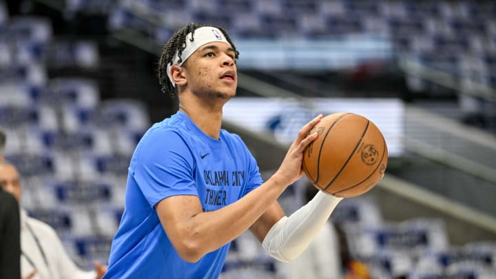 May 13, 2024; Dallas, Texas, USA; Oklahoma City Thunder forward Ousmane Dieng (13) warms up before the game between the Dallas Mavericks and the Oklahoma City Thunder in game four of the second round for the 2024 NBA playoffs at American Airlines Center. Mandatory Credit: Jerome Miron-USA TODAY Sports May 13, 2024; Dallas, Texas, USA; Oklahoma City Thunder forward Ousmane Dieng (13) warms up before the game between the Dallas Mavericks and the Oklahoma City Thunder in game four of the second round for the 2024 NBA playoffs at American Airlines Center. Mandatory Credit: Jerome Miron-USA TODAY Sports