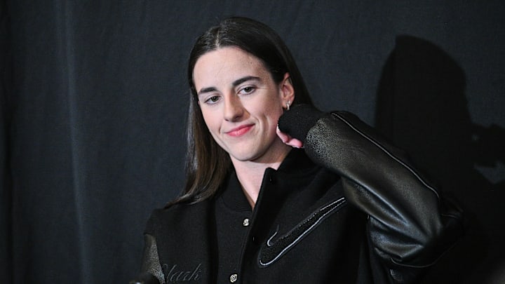 Feb 2, 2025; Iowa City, Iowa, USA; Former Iowa Hawkeyes player Caitlin Clark talks with the media before the game against the USC Trojans at Carver-Hawkeye Arena. The Hawkeyes will be retiring the jersey of Clark after the game. Mandatory Credit: Jeffrey Becker-Imagn Images