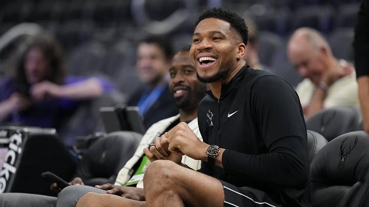 Apr 10, 2026; Milwaukee, Wisconsin, USA;  Milwaukee Bucks forward Giannis Antetokounmpo enjoys a moment during warmups prior to the game against the Brooklyn Nets at Fiserv Forum. Mandatory Credit: Jeff Hanisch-Imagn Images