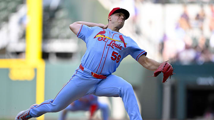 May 31, 2025; Arlington, Texas, USA; St. Louis Cardinals relief pitcher Ryan Helsley (56) pitches against the Texas Rangers during the ninth inning at Globe Life Field. Mandatory Credit: Jerome Miron-Imagn Images