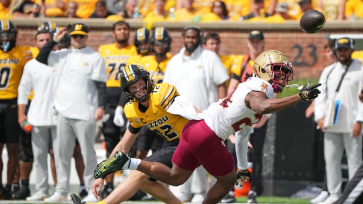 Sep 14, 2024; Columbia, Missouri, USA; Boston College Eagles cornerback Amari Jackson (24) tips a pass from Missouri Tigers quarterback Brady Cook (12) during the first half at Faurot Field at Memorial Stadium. Mandatory Credit: Denny Medley-Imagn Images