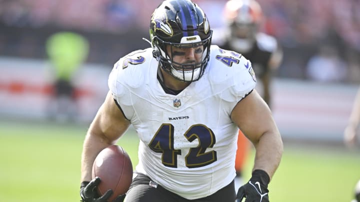 Oct 1, 2023; Cleveland, Ohio, USA; Baltimore Ravens fullback Patrick Ricard (42) runs after a catch in the fourth quarter against the Cleveland Browns at Cleveland Browns Stadium. Mandatory Credit: David Richard-USA TODAY Sports