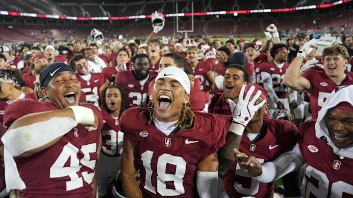 Sep 13, 2025; Stanford, California, USA; Stanford Cardinal players celebrate on the field after defeating the Boston College Eagles at Stanford Stadium. Mandatory Credit: Darren Yamashita-Imagn Images Sep 13, 2025; Stanford, California, USA; Stanford Cardinal players celebrate on the field after defeating the Boston College Eagles at Stanford Stadium. Mandatory Credit: Darren Yamashita-Imagn Images