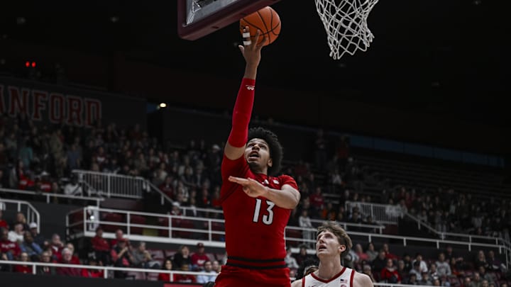 Jan 2, 2025; Stanford, California, USA; Louisville Cardinals forward Sananda Fru (13) goes for a layup during the first half against Stanford Cardinal at Maples Pavilion. Mandatory Credit: Justine Willard-Imagn Images
