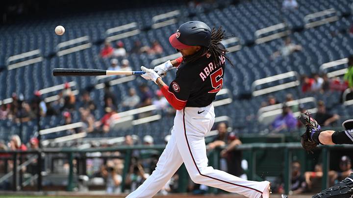 Aug 27, 2026; Washington, District of Columbia, USA; Washington Nationals designated hitter CJ Abrams (5) singles against the Colorado Rockies during the first inning at Nationals Park. Mandatory Credit: Brad Mills-Imagn Images