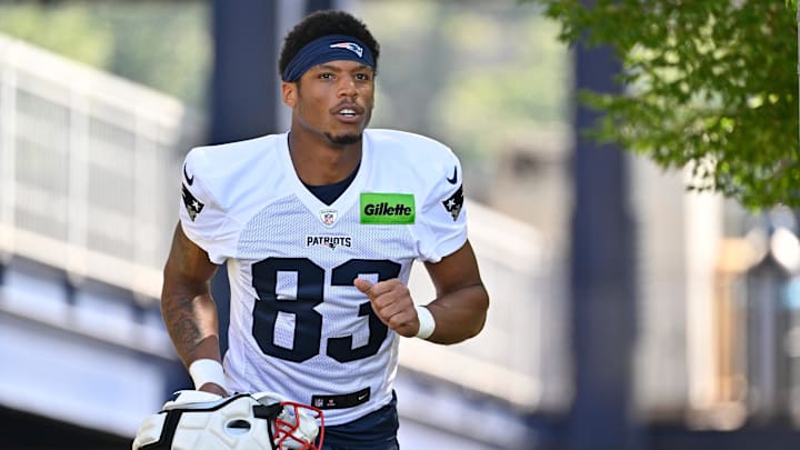 Jul 23, 2025; Foxborough, MA, USA; New England Patriots wide receiver John Jiles (83) jogs to the practice field for training camp at Gillette Stadium. Mandatory Credit: Eric Canha-Imagn Images