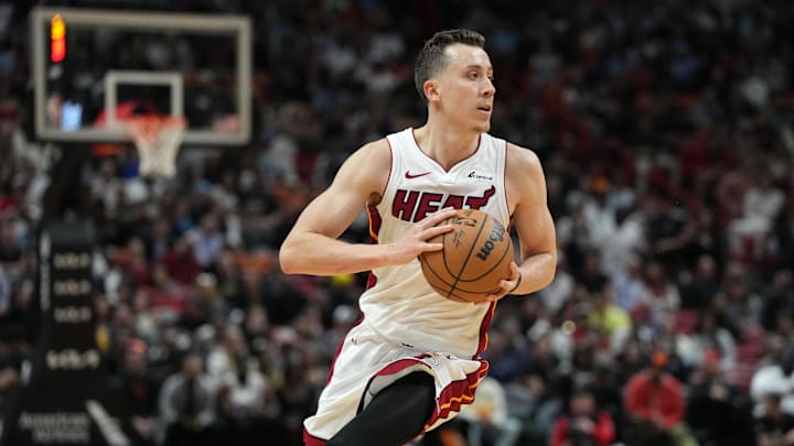 Jan 8, 2024; Miami, Florida, USA;  Miami Heat forward Duncan Robinson (55) sets up for a three-point