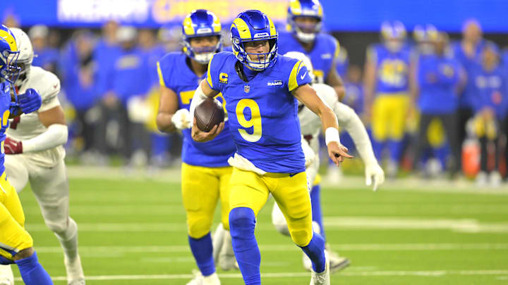 Dec 28, 2024; Inglewood, California, USA;   Los Angeles Rams quarterback Matthew Stafford (9) carries the ball to the 5-yard line in the first half against the Arizona Cardinals at SoFi Stadium. Mandatory Credit: Jayne Kamin-Oncea-Imagn Images