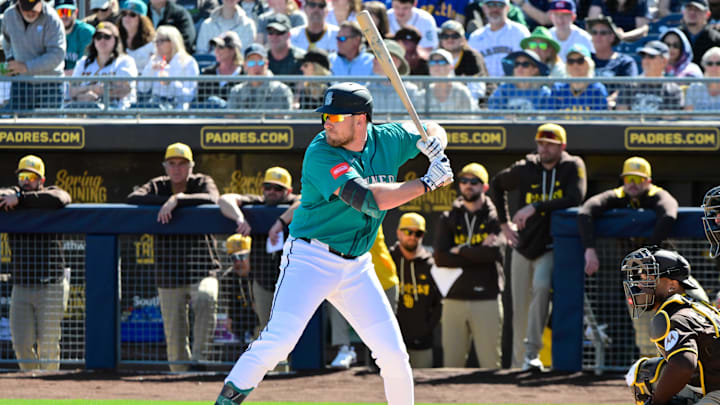 Feb 20, 2026; Peoria, Arizona, USA; Seattle Mariners right fielder Luke Raley (20) singles in the first inning against the San Diego Padres during a Spring Training game at Peoria Sports Complex. Mandatory Credit: Matt Kartozian-Imagn Images Feb 20, 2026; Peoria, Arizona, USA; Seattle Mariners right fielder Luke Raley (20) singles in the first inning against the San Diego Padres during a Spring Training game at Peoria Sports Complex. Mandatory Credit: Matt Kartozian-Imagn Images