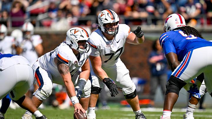 Oct 17, 2026; Dallas, Texas, USA; Virginia Cavaliers offensive lineman Drake Metcalf (60) and offensive lineman Noah Josey (77) in action during the game between the Mustangs and the Cavaliers at Gerald J. Ford Stadium. Mandatory Credit: Jerome Miron-Imagn Images Oct 17, 2026; Dallas, Texas, USA; Virginia Cavaliers offensive lineman Drake Metcalf (60) and offensive lineman Noah Josey (77) in action during the game between the Mustangs and the Cavaliers at Gerald J. Ford Stadium. Mandatory Credit: Jerome Miron-Imagn Images