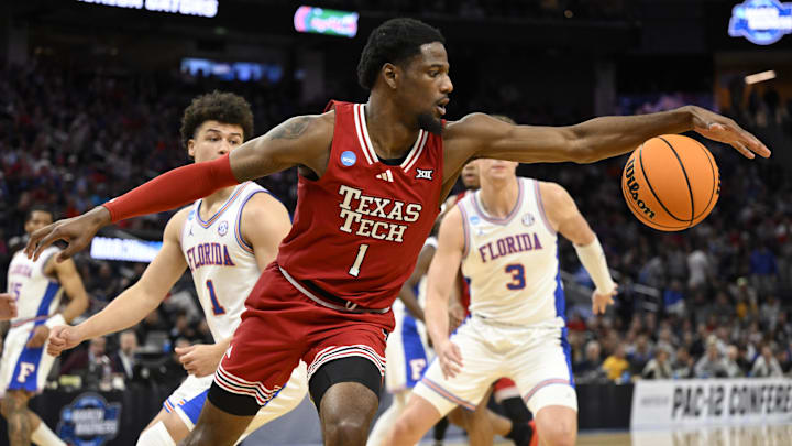 Mar 29, 2025; San Francisco, CA, USA; Texas Tech Red Raiders guard Kevin Overton (1) secures a loose ball during the second half against the Florida Gators during the West Regional final of the 2025 NCAA tournament at Chase Center. Mandatory Credit: Eakin Howard-Imagn Images