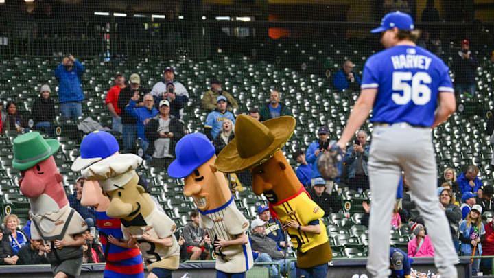 Apr 2, 2025; Milwaukee, Wisconsin, USA; Kansas City Royals pitcher Hunter Harvey (56) waits for the sausge race in the sixth inning against the Milwaukee Brewers at American Family Field. Mandatory Credit: Benny Sieu-Imagn Images Apr 2, 2025; Milwaukee, Wisconsin, USA; Kansas City Royals pitcher Hunter Harvey (56) waits for the sausge race in the sixth inning against the Milwaukee Brewers at American Family Field. Mandatory Credit: Benny Sieu-Imagn Images