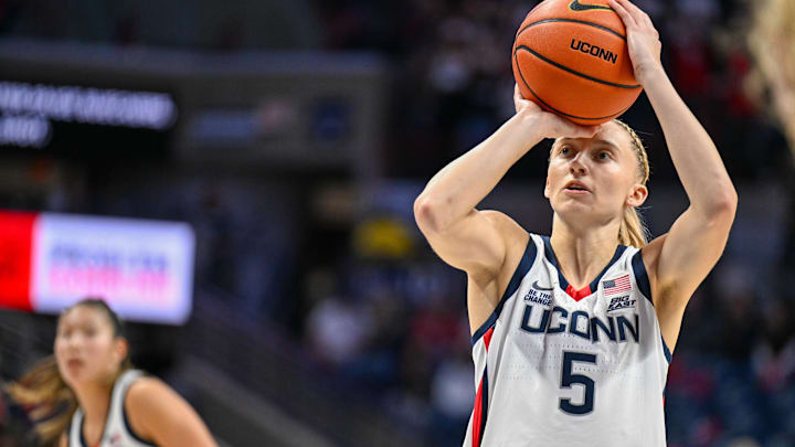 Nov 20, 2024; Storrs, Connecticut, USA; Connecticut Huskies guard Paige Bueckers (5) shoots a free throw during the second half against the Fairleigh Dickinson Knights at Harry A. Gampel Pavilion. Mandatory Credit: Mark Smith-Imagn Images Nov 20, 2024; Storrs, Connecticut, USA; Connecticut Huskies guard Paige Bueckers (5) shoots a free throw during the second half against the Fairleigh Dickinson Knights at Harry A. Gampel Pavilion. Mandatory Credit: Mark Smith-Imagn Images