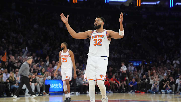 Feb 20, 2025; New York, New York, USA; New York Knicks center Karl-Anthony Towns (32) reacts to a play against the Chicago Bulls during the overtime at Madison Square Garden. Mandatory Credit: Gregory Fisher-Imagn Images