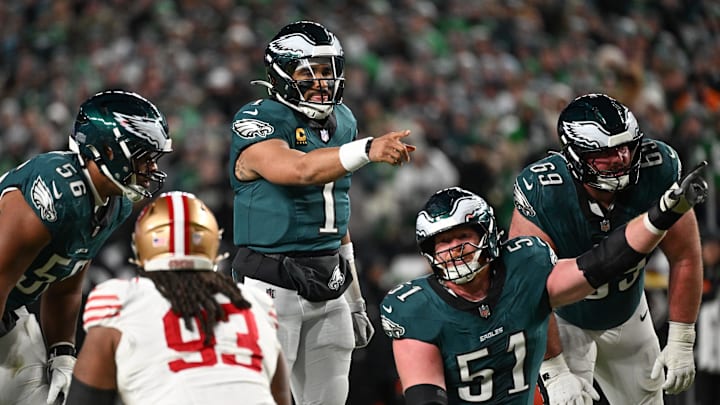 Jan 11, 2026; Philadelphia, PA, USA; Philadelphia Eagles quarterback Jalen Hurts (1) calls a play at the line of scrimmage against the San Francisco 49ers during the second quarter in an NFC Wild Card Round game at Lincoln Financial Field. 
