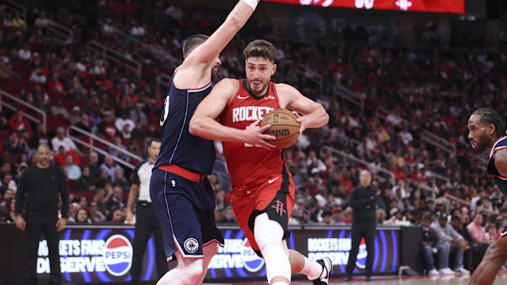 Dec 11, 2025; Houston, Texas, USA; Houston Rockets center Alperen Sengun (28) drives with the ball as Los Angeles Clippers center Ivica Zubac (40) defends during the fourth quarter at Toyota Center. Mandatory Credit: Troy Taormina-Imagn Images Dec 11, 2025; Houston, Texas, USA; Houston Rockets center Alperen Sengun (28) drives with the ball as Los Angeles Clippers center Ivica Zubac (40) defends during the fourth quarter at Toyota Center. Mandatory Credit: Troy Taormina-Imagn Images