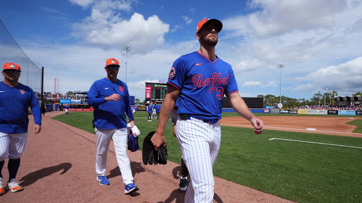 Feb 22, 2025; Port St. Lucie, Florida, USA; New York Mets pitcher Clay Holmes (35) walks in from the bullpen area before the game against the Houston Astros at Clover Park. Mandatory Credit: Jim Rassol-Imagn Images