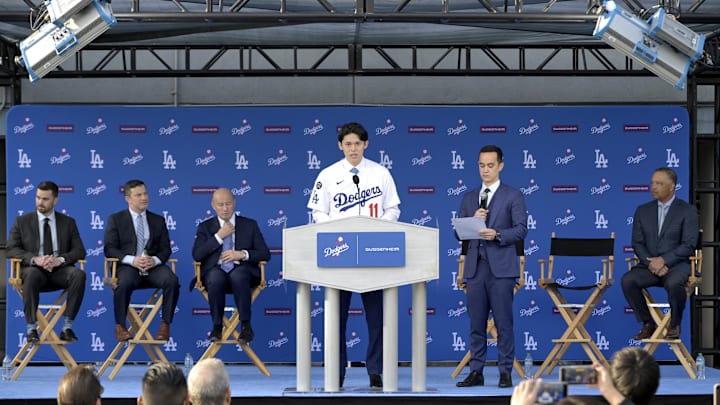 Jan 22, 2025; Los Angeles, CA, USA; Los Angeles Dodgers pitcher Roki Sasaki (11) speaks during an introductory press conference at Dodger Stadium. Mandatory Credit: Jayne Kamin-Oncea-Imagn Images Jan 22, 2025; Los Angeles, CA, USA; Los Angeles Dodgers pitcher Roki Sasaki (11) speaks during an introductory press conference at Dodger Stadium. Mandatory Credit: Jayne Kamin-Oncea-Imagn Images