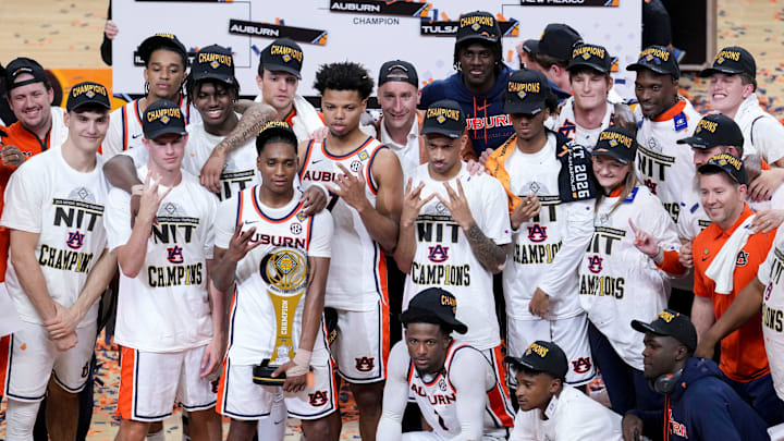 The Auburn Tigers celebrate Sunday, April 5, 2026, after defeating the Tulsa Golden Hurricane in the men’s NIT championship game at Gainbridge Fieldhouse in Indianapolis.