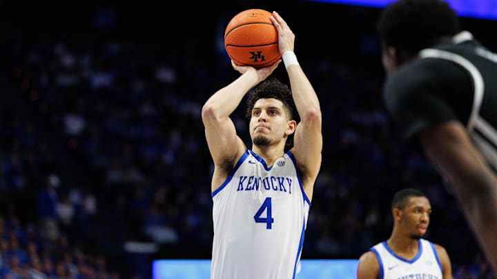 Dec 31, 2024; Lexington, Kentucky, USA; Kentucky Wildcats guard Koby Brea (4) shoots a free throw during the second half Brown Bears at Rupp Arena at Central Bank Center. Mandatory Credit: Jordan Prather-Imagn Images