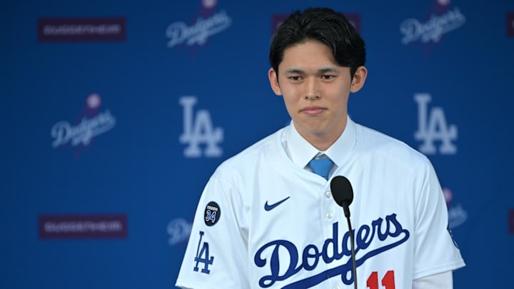 Jan 22, 2025; Los Angeles, CA, USA; Los Angele Dodgers pitcher Roki Sasaki (11) speaks during an introductory press conference at Dodger Stadium. Mandatory Credit: Jayne Kamin-Oncea-Imagn Images Jan 22, 2025; Los Angeles, CA, USA; Los Angele Dodgers pitcher Roki Sasaki (11) speaks during an introductory press conference at Dodger Stadium. Mandatory Credit: Jayne Kamin-Oncea-Imagn Images