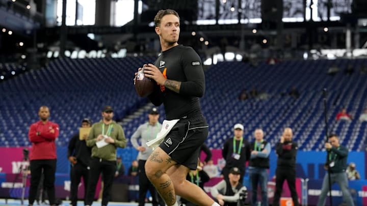 Feb 28, 2026; Indianapolis, IN, USA; Miami quarterback Carson Beck (QB04) during the NFL Scouting Combine at Lucas Oil Stadium. Mandatory Credit: Kirby Lee-Imagn Images