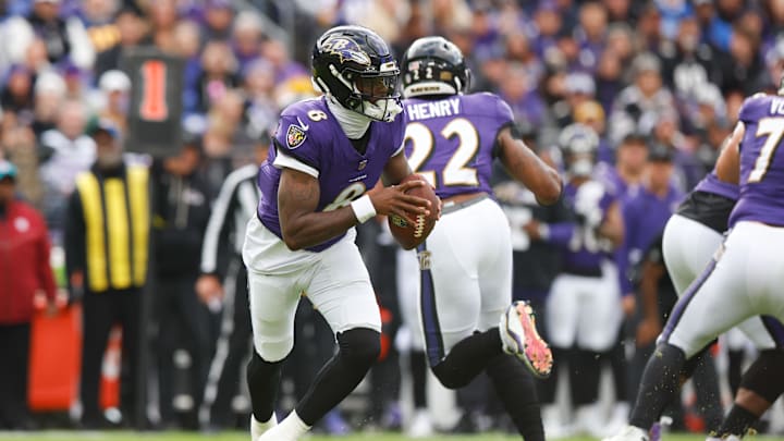 Nov 23, 2025; Baltimore, Maryland, USA; Baltimore Ravens quarterback Lamar Jackson (8) looks to pass during the first quarter against the New York Jets at M&T Bank Stadium. Mandatory Credit: Peter Casey-Imagn Images