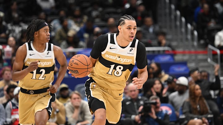 Nov 16, 2025; Washington, District of Columbia, USA;  Washington Wizards forward Kyshawn George (18) dribbles the ball up court against the Brooklyn Nets during the fourth quarter at Capital One Arena. Mandatory Credit: Rafael Suanes-Imagn Images