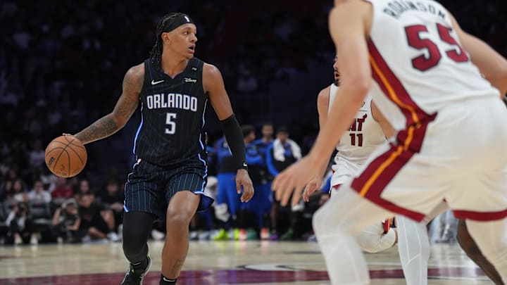 Oct 23, 2024; Miami, Florida, USA;  Orlando Magic forward Paolo Banchero (5) sets up the offense against the Miami Heat during the second half at Kaseya Center. Mandatory Credit: Jim Rassol-Imagn Images