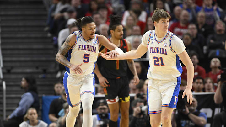 Mar 27, 2025; San Francisco, CA, USA; Florida Gators guard Will Richard (5) and forward Alex Condon (21) high-five during the second half against the Maryland Terrapins during a West Regional semifinal of the 2025 NCAA tournament at Chase Center. Mandatory Credit: Eakin Howard-Imagn Images